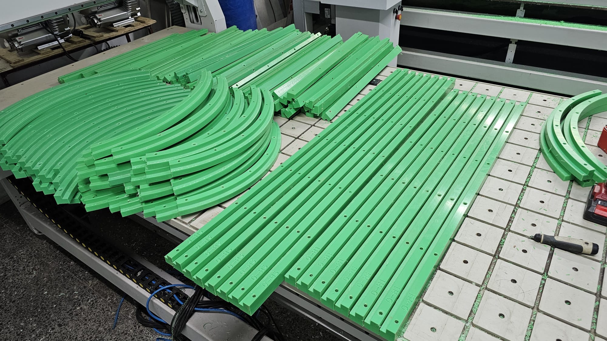 Batch Production of CNC Machined Plastic Conveyor Guides and Wear Strips for Industrial and Food Processing Lines.